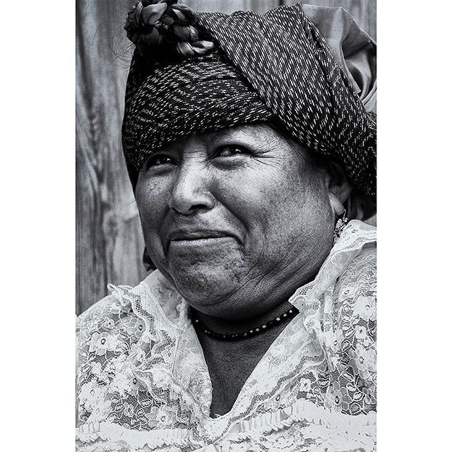 PORTRAIT - FACES OF MEXICO

Many of the indigenous people of Oaxaca State are reserved in front of a camera. I found this lady selling her crops at the Tlacolula market and after a few friendly words in desperate English, French, Greek and of course my poor Spanish, she allowed me to photograph her for 20 pesos. 
It is obvious that shes curious about my intentions but shes amused about the process. 
I wish I had a better camera on this trip and more time to really photograph people the way they deserve to be.

#oaxaca #tlacolula #mexico #indigenous #market #bw #portrait #oldschool #spiro #spiro_photographer #spirophotographer