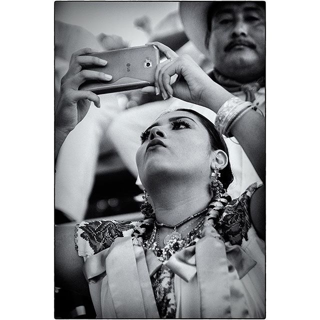 Guelaguetza festival. - FACES 
Photographing the photographer.
Performer waiting for showtime
Preparations and dressing behind the scenes, before Showtime.

#iloveoaxaca #oaxaca #mexico #oaxacamexico #culture #culturalfestival #spirit #soul #beauty #colour #backstage #celebration #dance #bts #dressing #faces #waiting #group #music #festival #guelaguetza #guelaguetza2016 #discover #spiro #spiro_photographer #spirophotographer